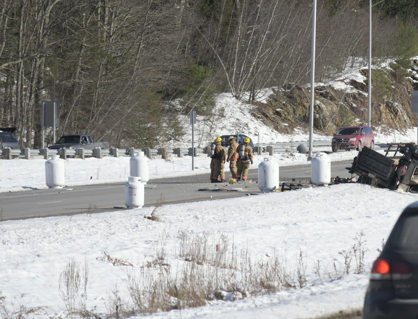 Route 101 closed in both directions by load of propane tanks spilled in Raymond crash
